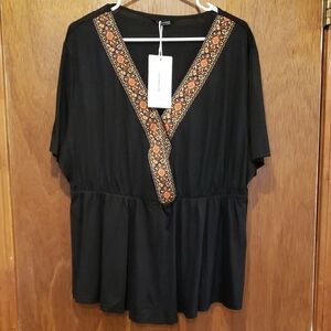 New BloomChic Elegant Black Top with Intricate Orange Ribbon Trim
